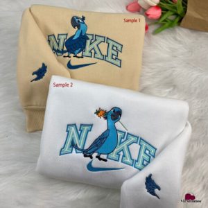 Cute Rio Movie Blu And Jewel Couple Nike Embroidered Sweatshirts Nike Embroidery Matching Personalized Gifts For Him 0 512x512 2.jpg