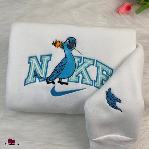 Cute Rio Movie Blu And Jewel Couple Nike Embroidered Sweatshirts Nike Embroidery Matching Personalized Gifts For Him 2 512x512 1.jpg