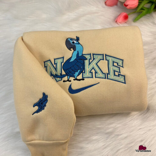 Cute Rio Movie Blu And Jewel Couple Nike Embroidered Sweatshirts Nike Embroidery Matching Personalized Gifts For Him 3 512x512 1.jpg