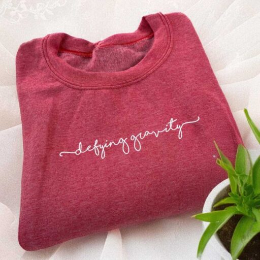 Defying Gravity Wicked Musical Embroidered Sweatshirt Elphaba And Glinda Wicked Sweatshirt Wicked Hoodie 4 512x512 2.jpg